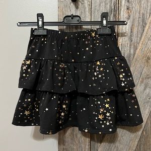 Nine 1 Eight Girls Size Small Ruffle Skirt in Black with Gold Stars